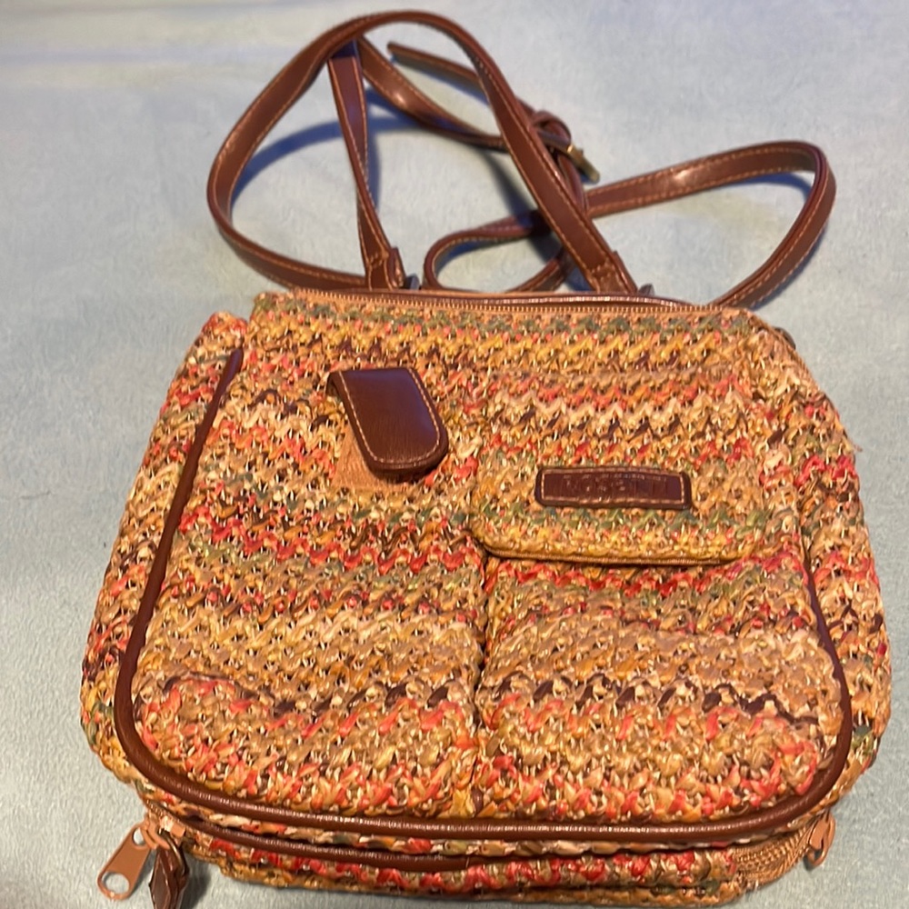 Rossetti purse  comes with a mini mirror an multiple different pockets